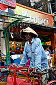 Riding the becak, the local cycle rickshaws in Malioboro street Yogyakarta.